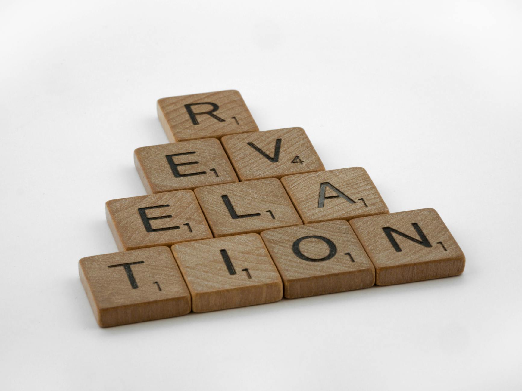revelation sign out of scrabble tiles